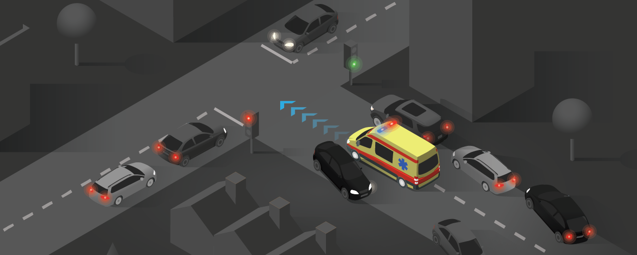 Emergency vehicle driving through a corridor formed by vehicles